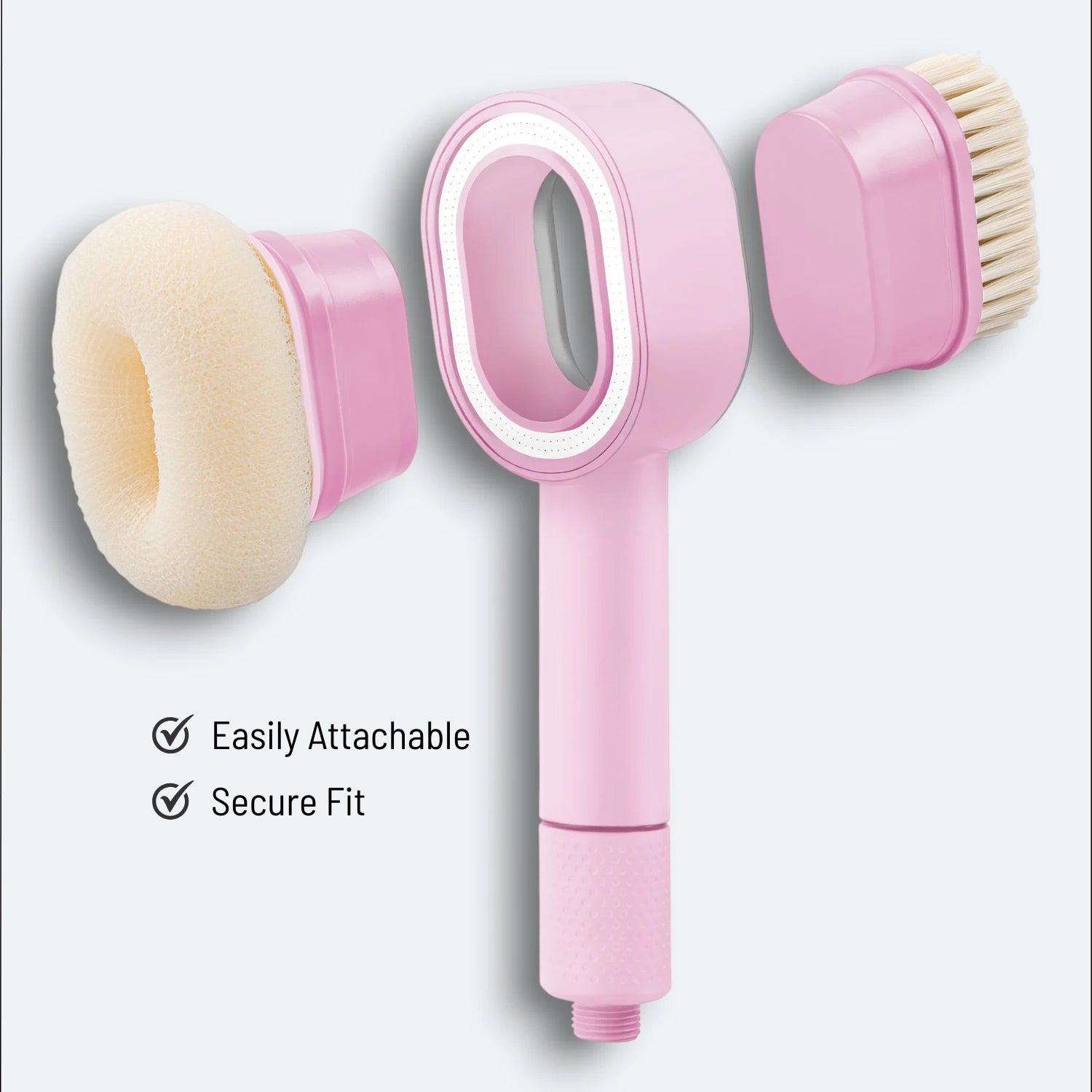 A shower head and floating magnetic snap-on exfoliating sponge and soft brush on a light gray background #Color=Pink