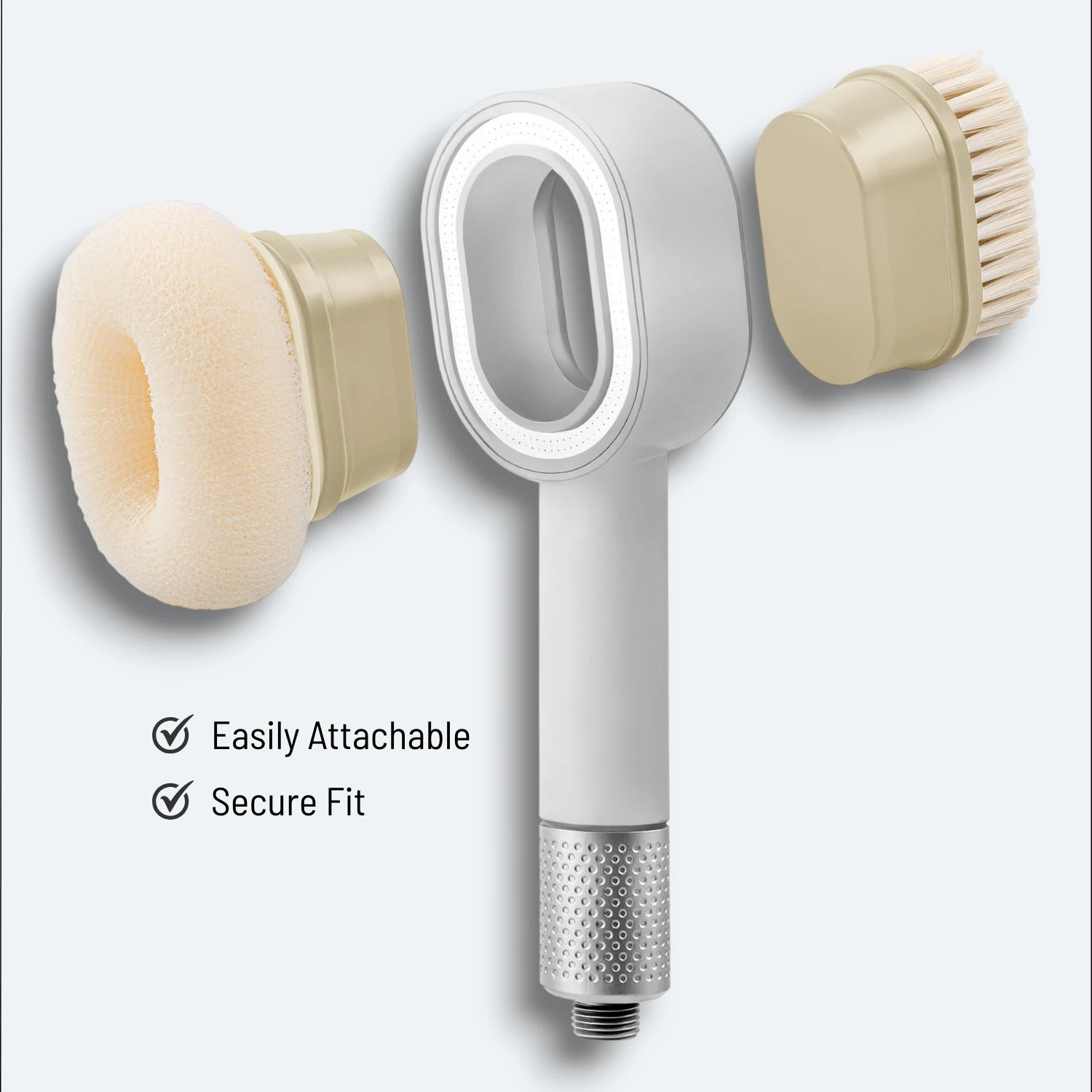 A shower head and floating magnetic snap-on exfoliating sponge and soft brush on a light gray background #Color=Light Bronze